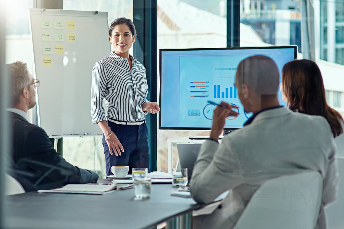 Cropped shot of a businesswoman delivering a presentation in the boardroom